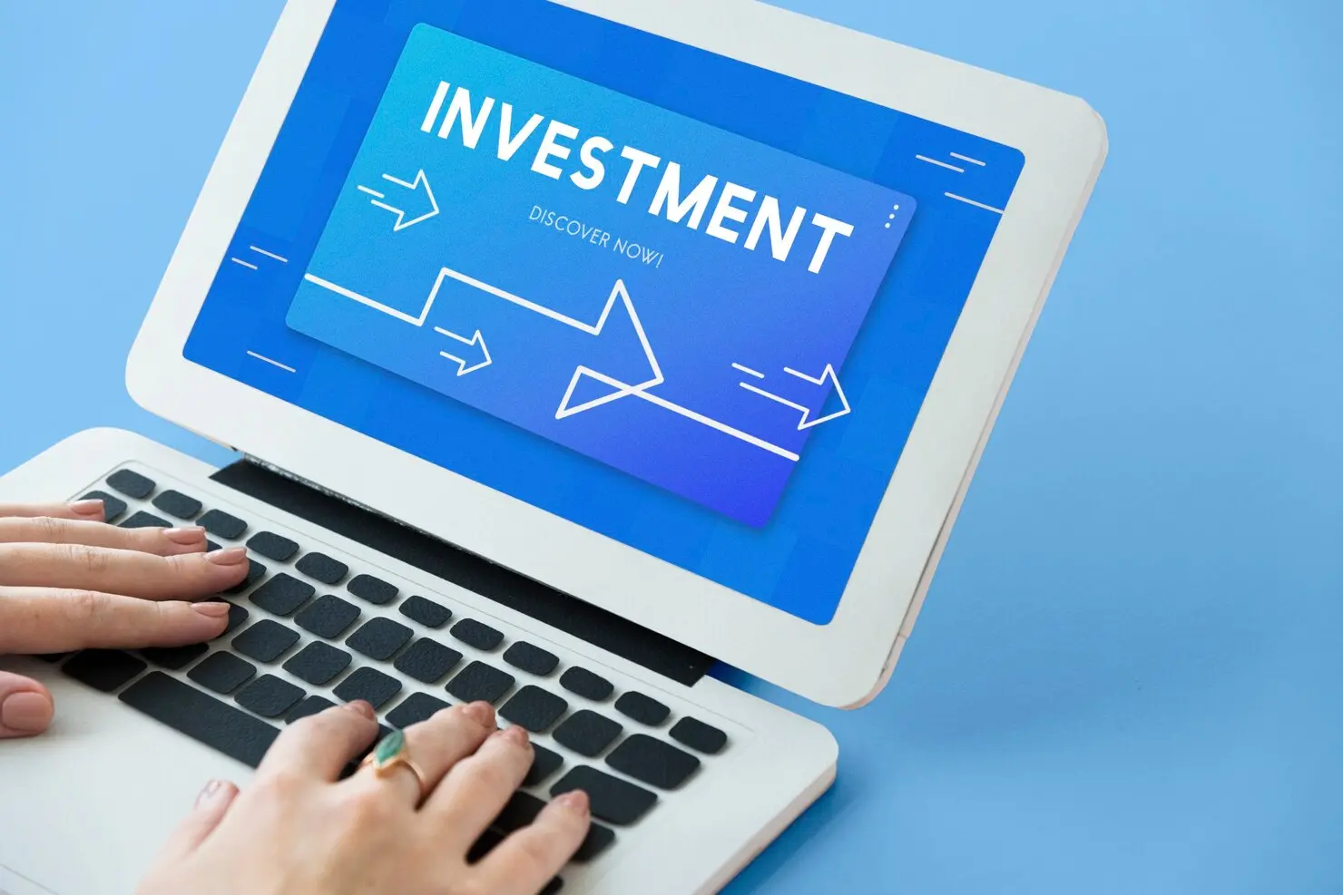 Investment loan planning with financial growth chart on laptop screen